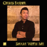 A man standing in front of a wall with the words " chris jasper share with me ".