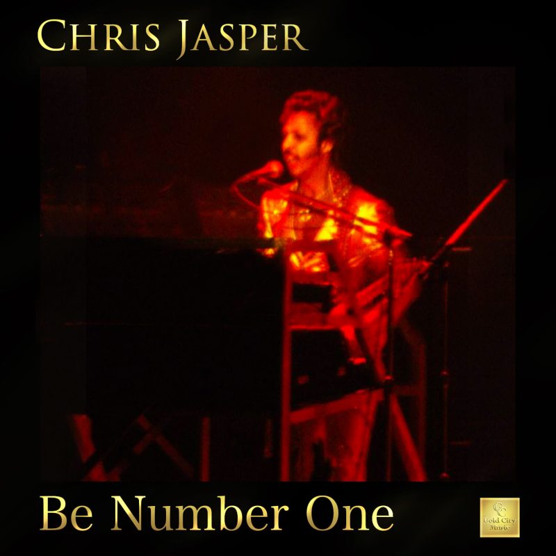 Red-lit album cover: singer at piano